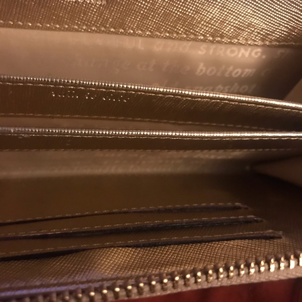 Metallic Gold Kate Spade Wristlet; good condition. - Picture 8 of 8